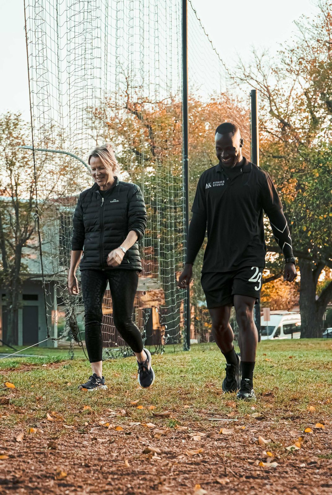 Amadu Koroma coaching a client on a walk outdoors near AK Fitness Studio, Richmond